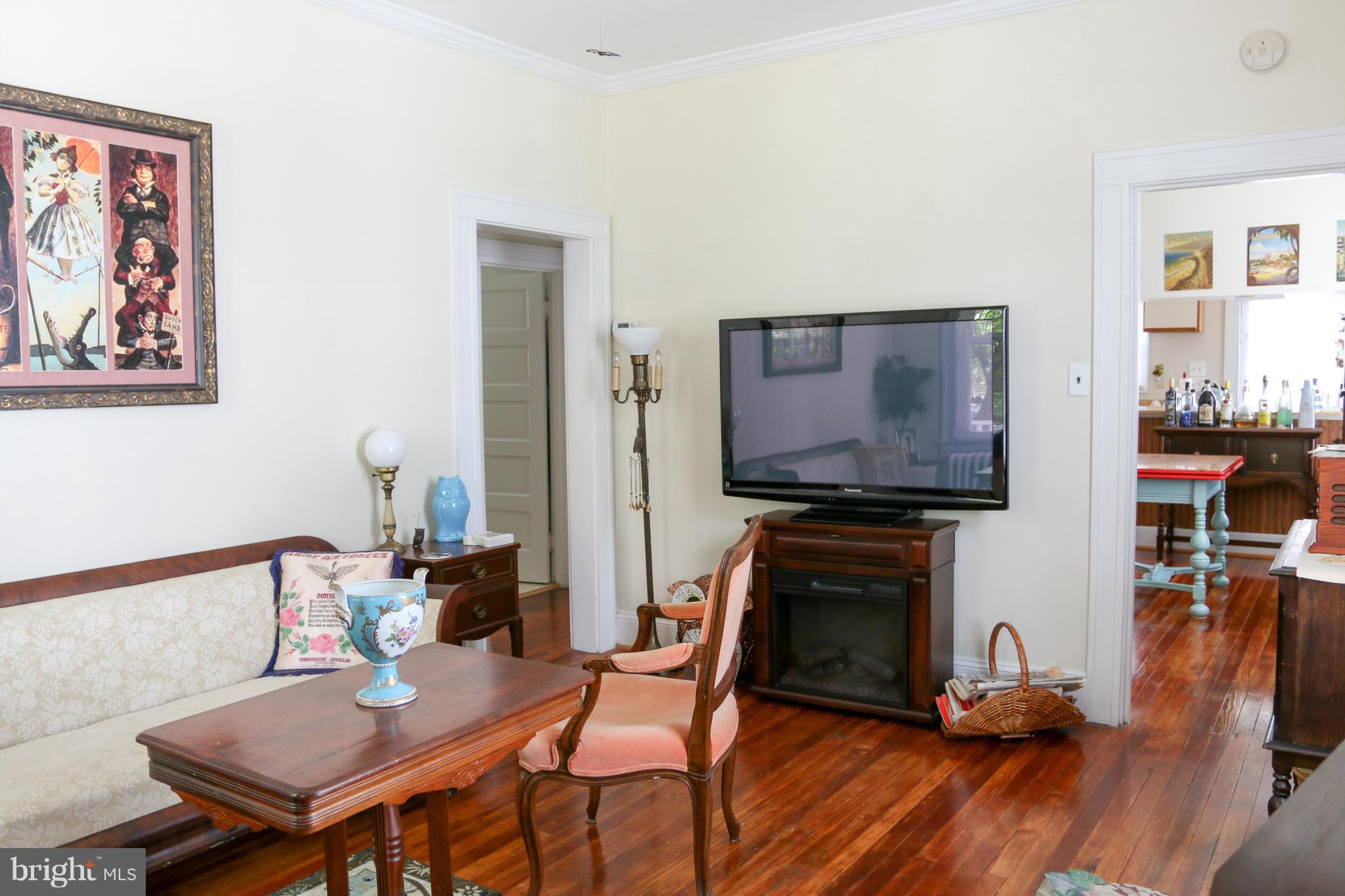 2212 Corbin Road Baltimore, MD 21214 - Photo 4 of 17 Living Room with Hardwood Floors