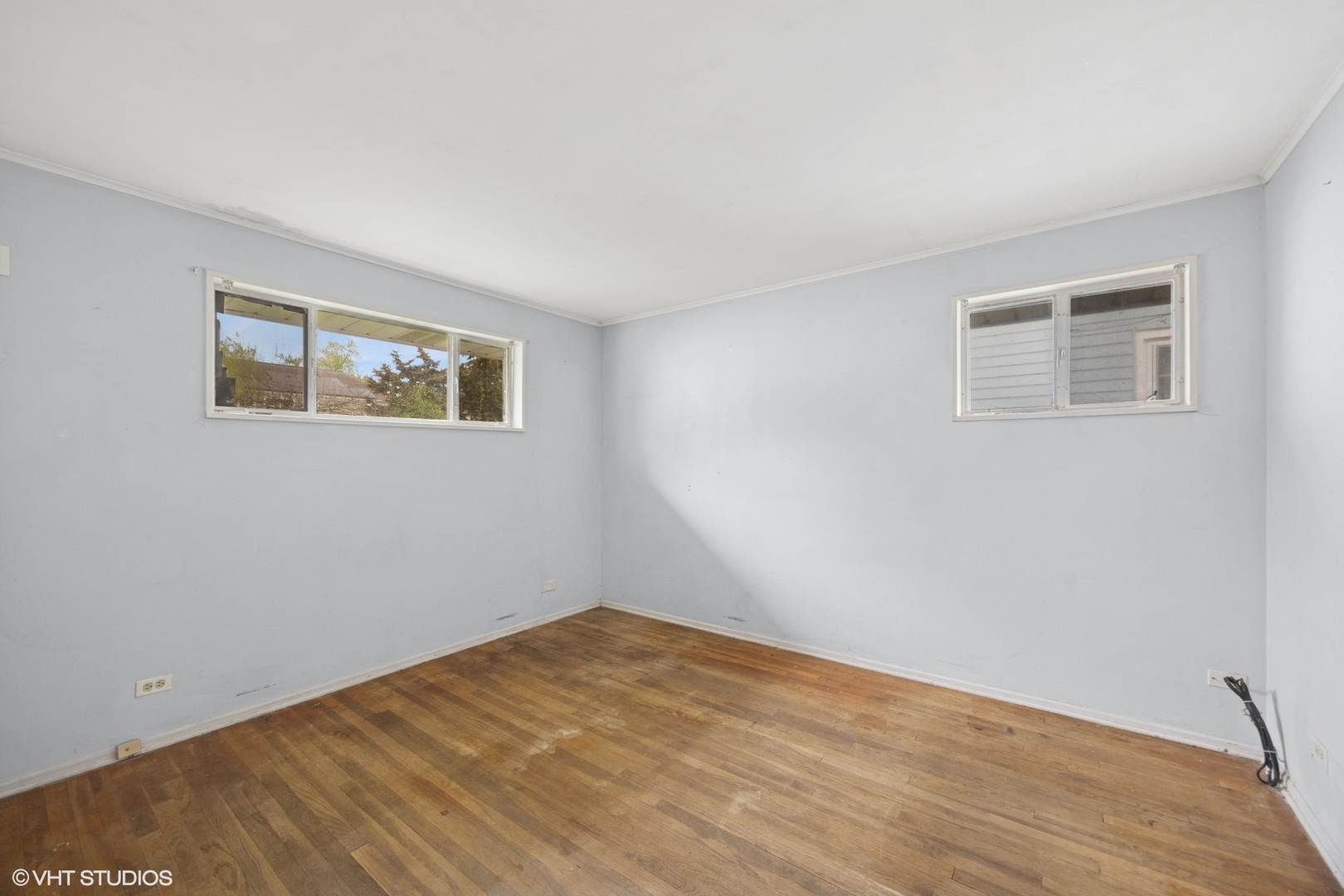 1425 North Wilke Road Arlington Heights, IL 60004 - Photo 7 of 12 a view of empty room with wooden floor