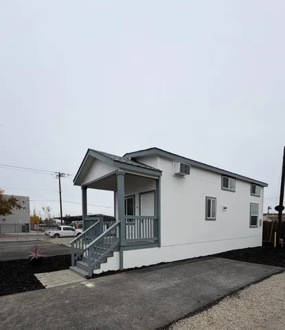 a view of a house with a patio