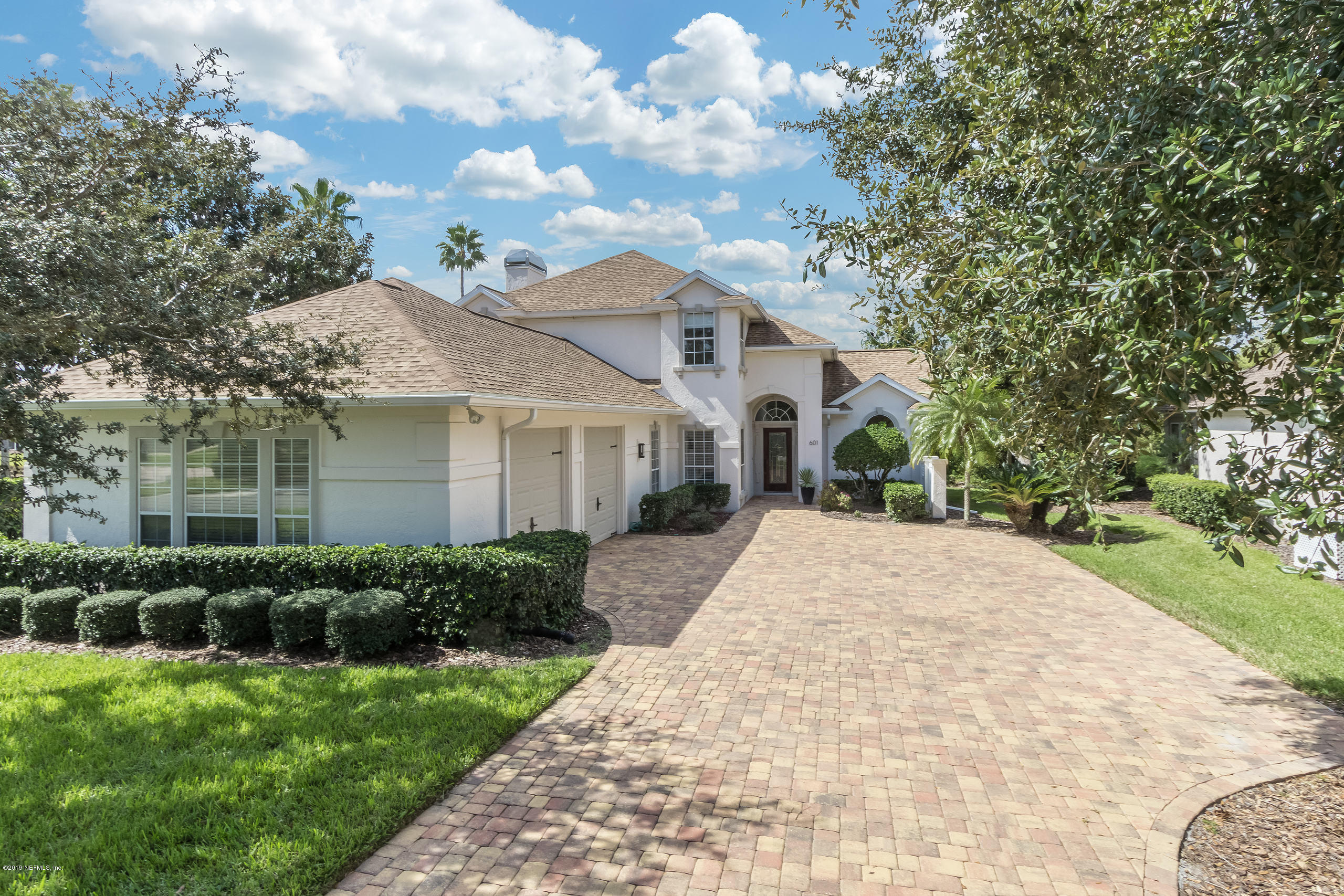 601 Teeside Court St. Augustine, FL 32080 - Photo 1 of 38 a front view of a house with garden