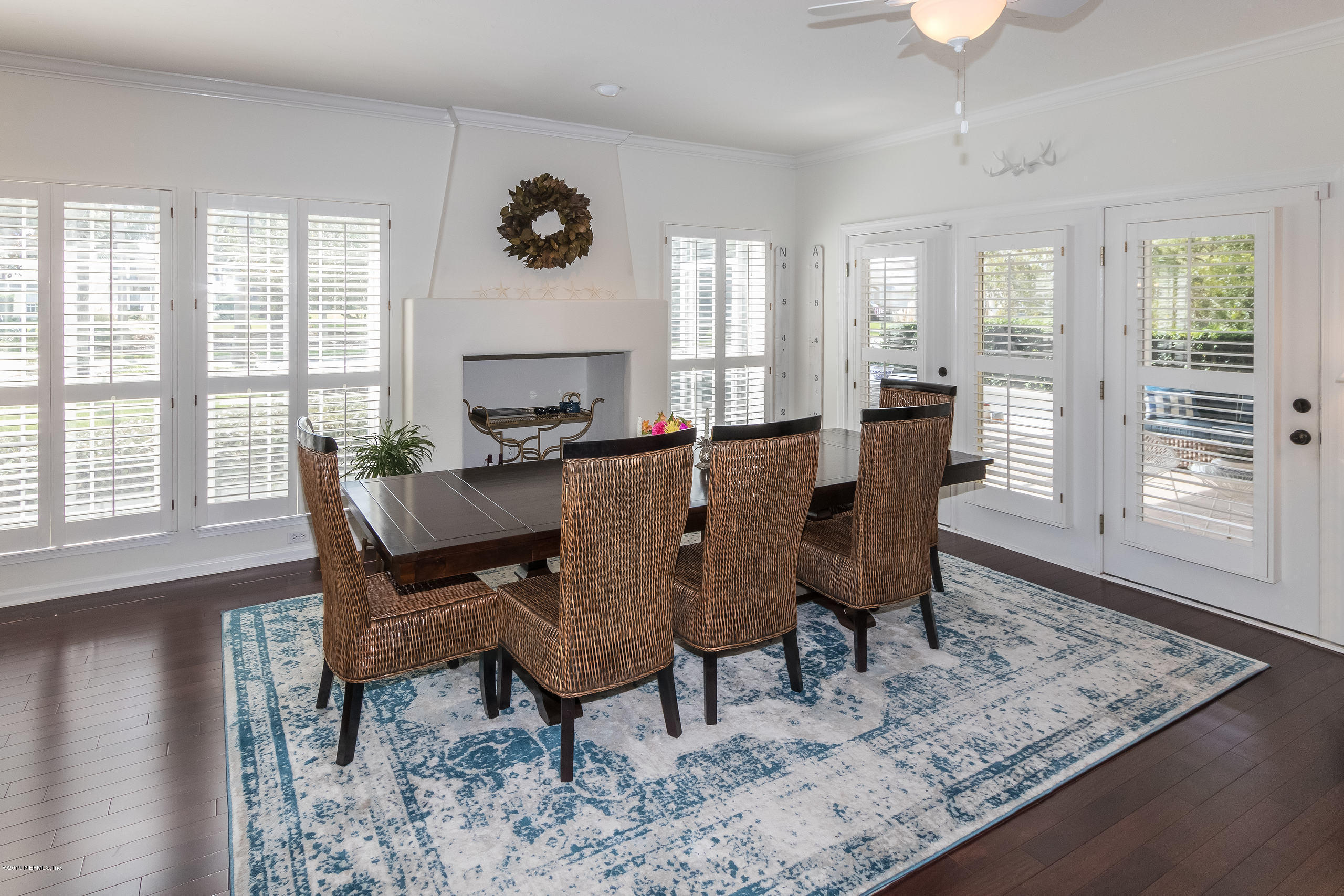 601 Teeside Court St. Augustine, FL 32080 - Photo 15 of 38 a view of a dining room with furniture window and wooden floor