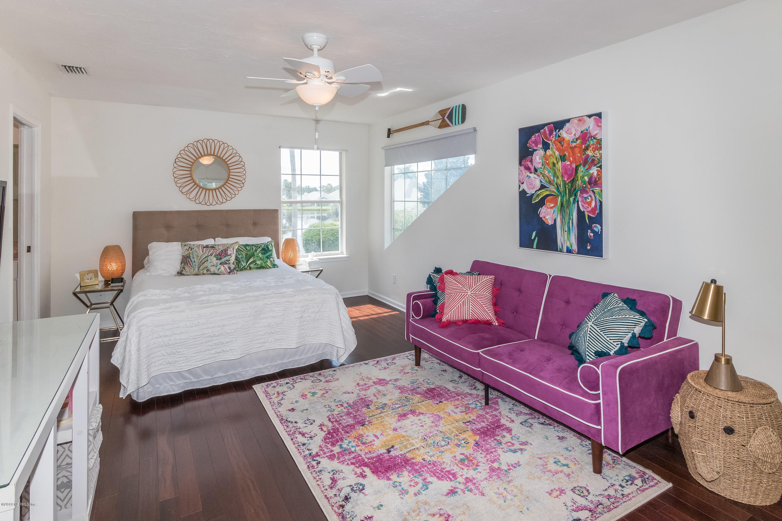 601 Teeside Court St. Augustine, FL 32080 - Photo 20 of 38 a bedroom with furniture and a large window
