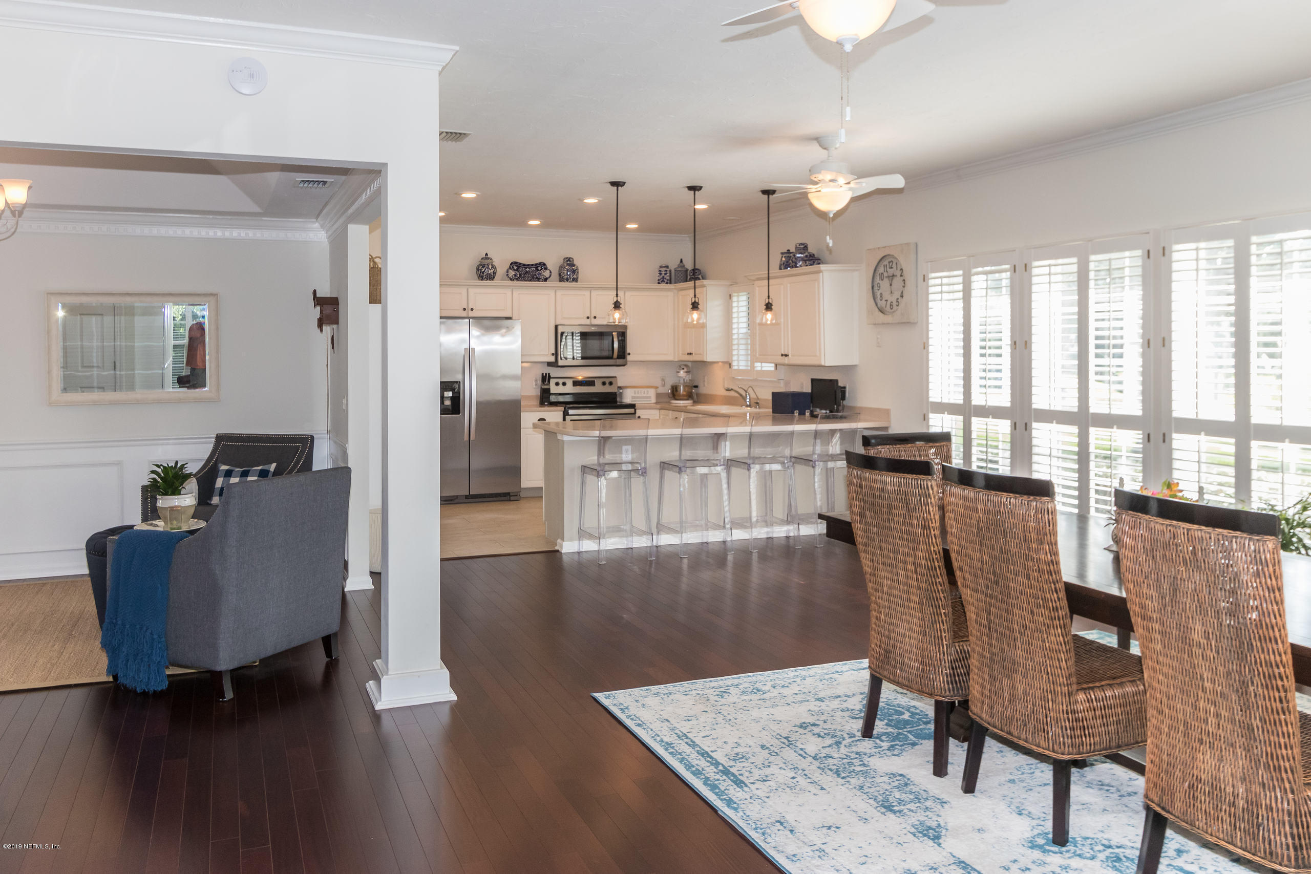 601 Teeside Court St. Augustine, FL 32080 - Photo 6 of 38 a view of a dining room with furniture window and wooden floor