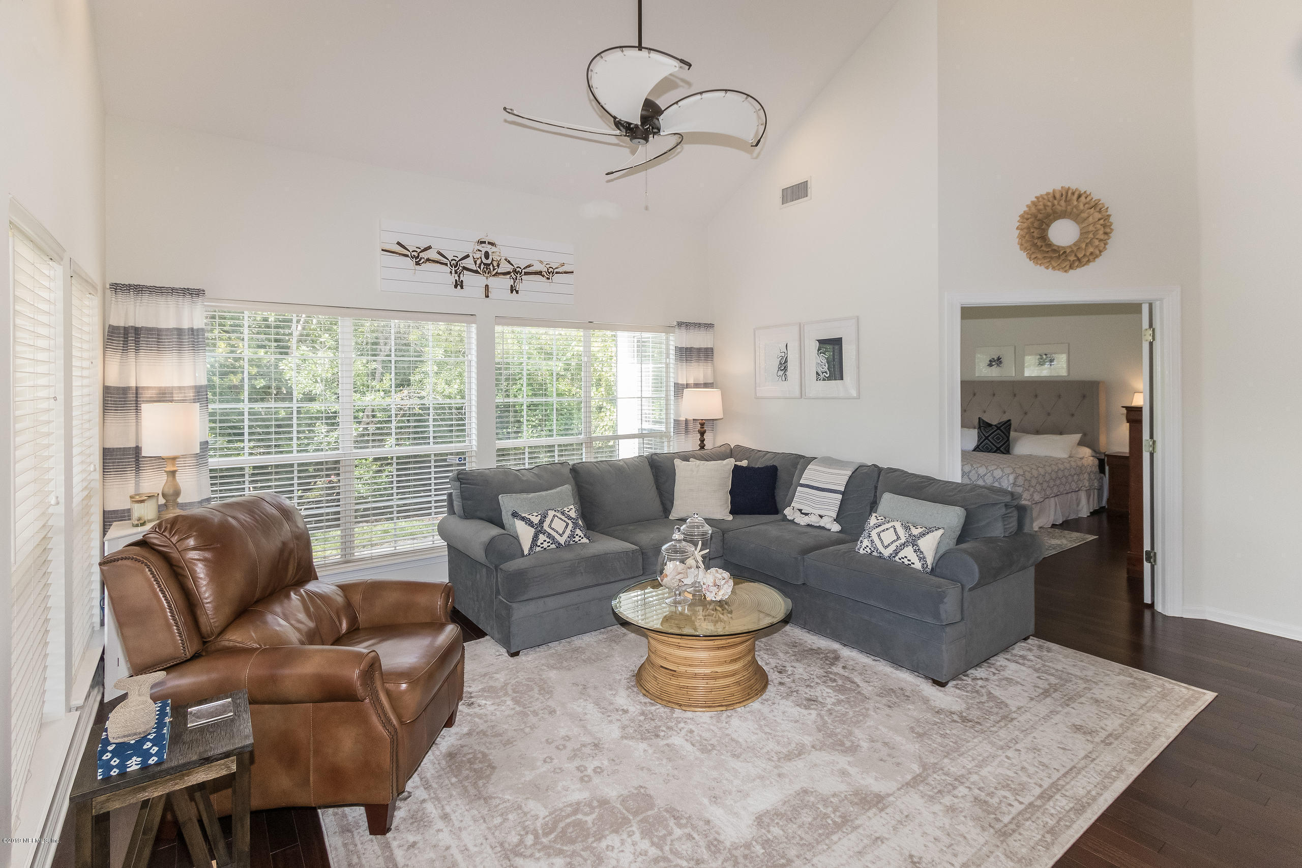 601 Teeside Court St. Augustine, FL 32080 - Photo 8 of 38 a living room with furniture a rug and a window