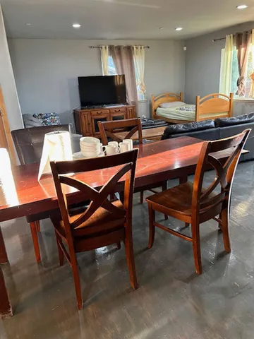 a bedroom with a bed and a lamp