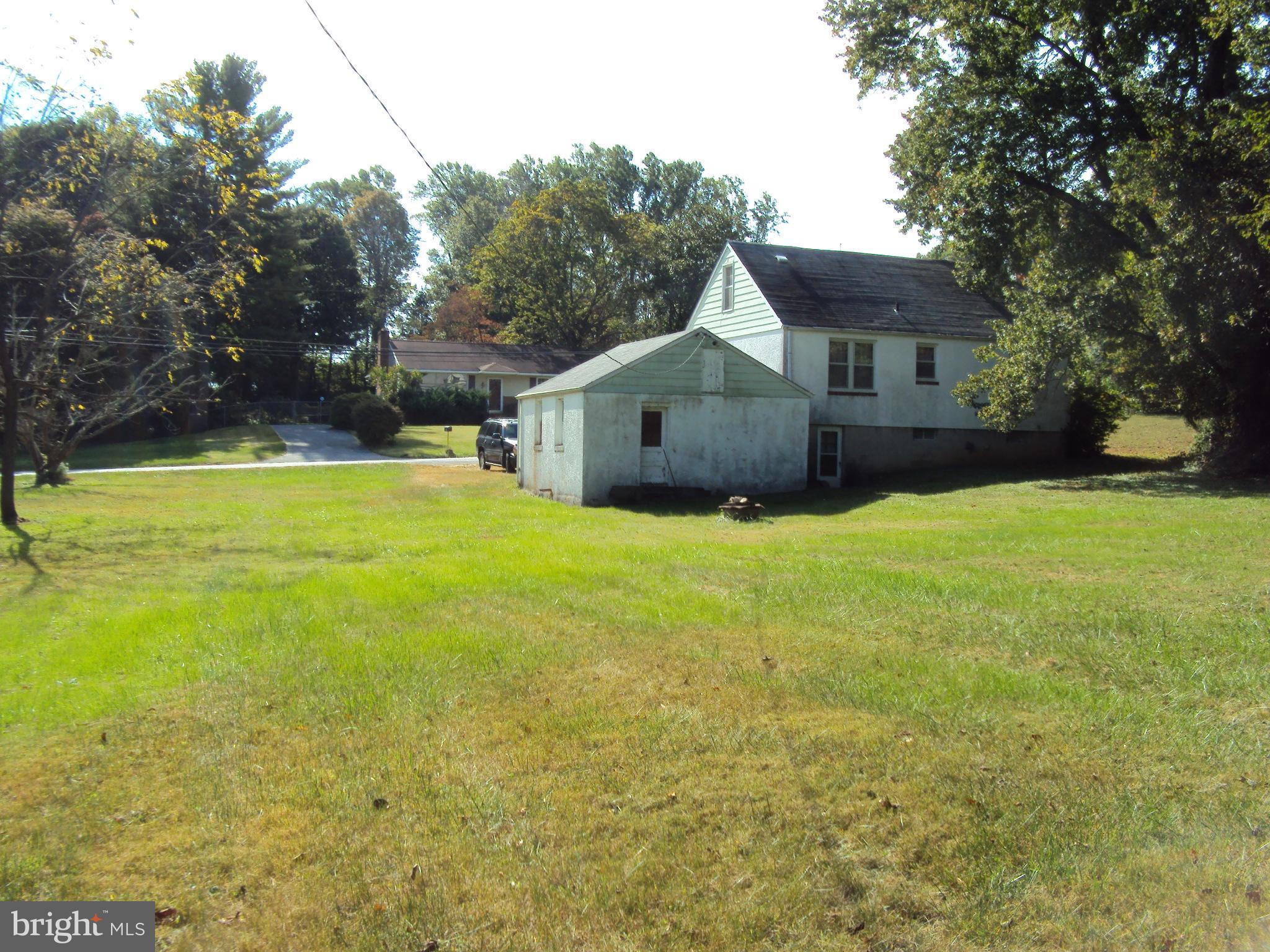42 Ritters Lane Owings Mills, MD 21117 - Photo 2 of 7 Rear View of Dwelling