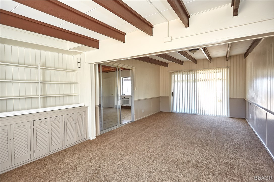 19616 Huasna Road Apple Valley, CA 92307 - Photo 19 of 48 a view of an empty room with a window