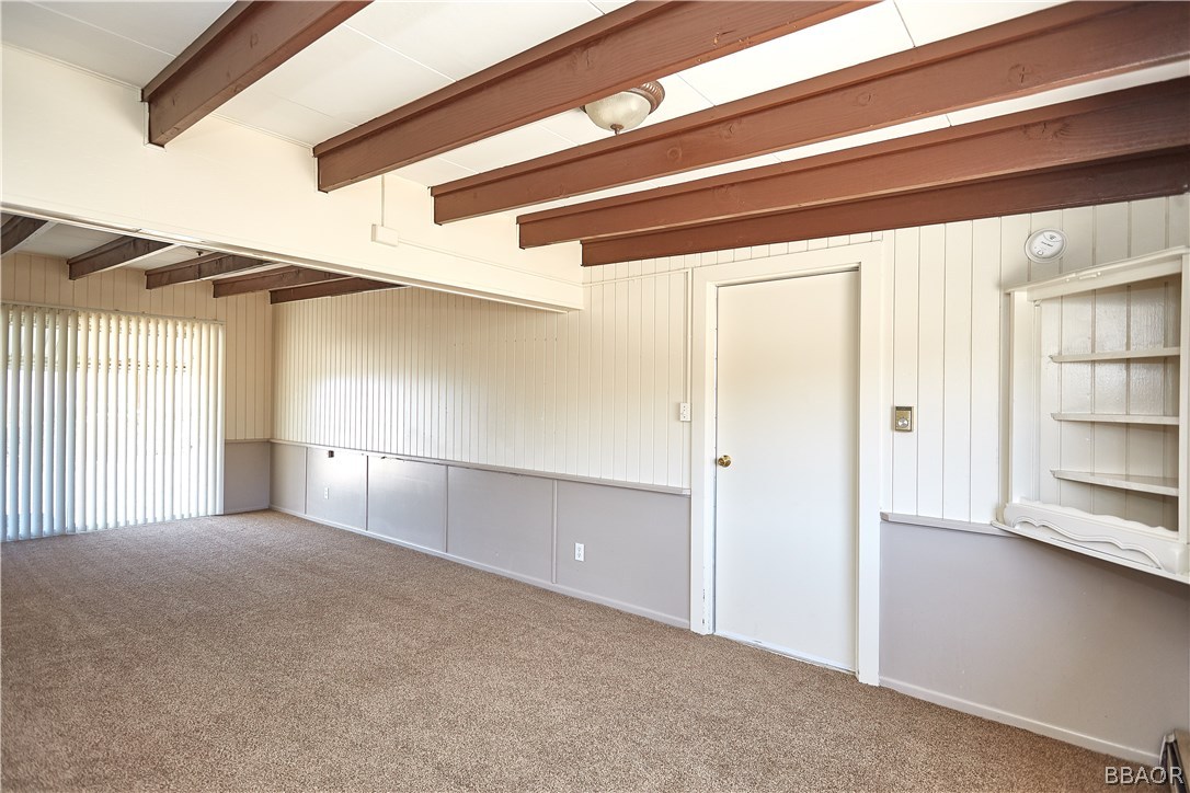19616 Huasna Road Apple Valley, CA 92307 - Photo 20 of 48 a view of a livingroom with an empty space