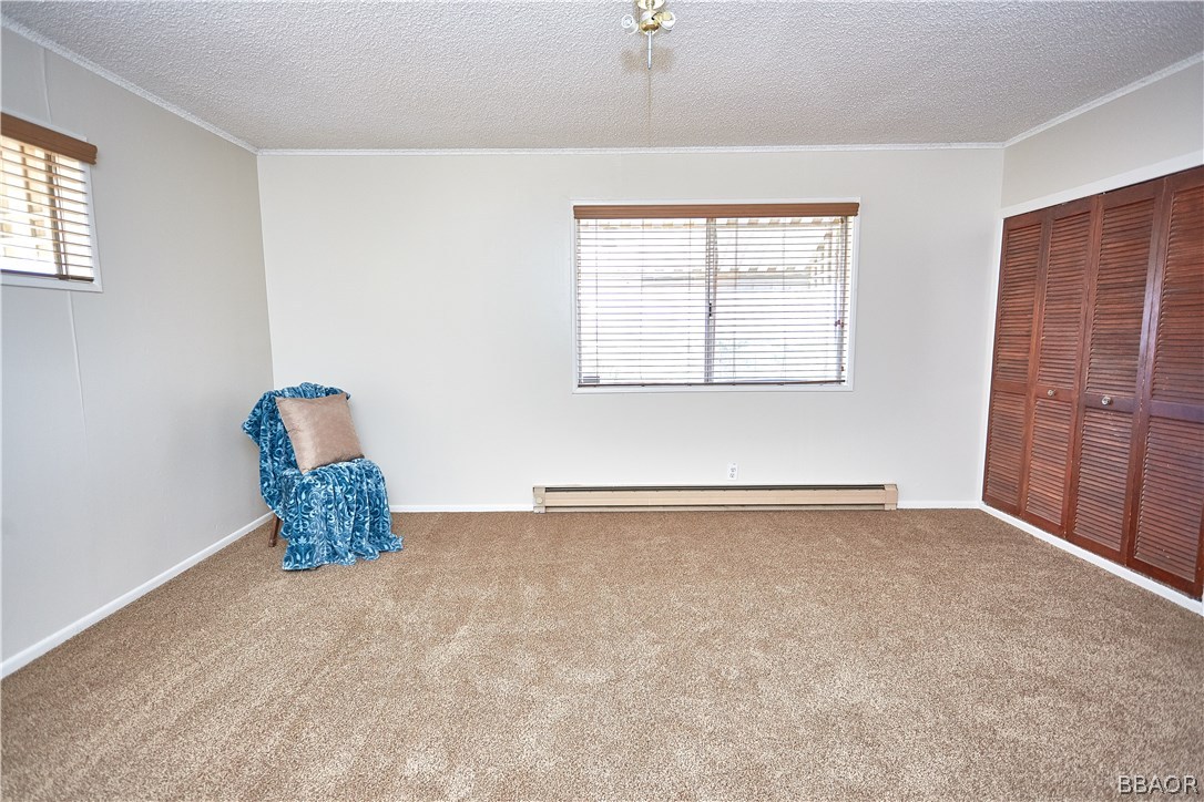 19616 Huasna Road Apple Valley, CA 92307 - Photo 24 of 48 an empty room with windows