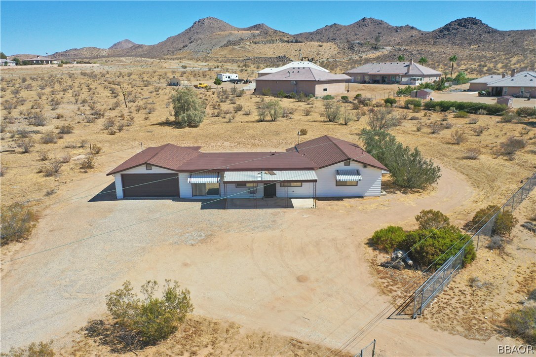 19616 Huasna Road Apple Valley, CA 92307 - Photo 46 of 48 a view of houses with sky view