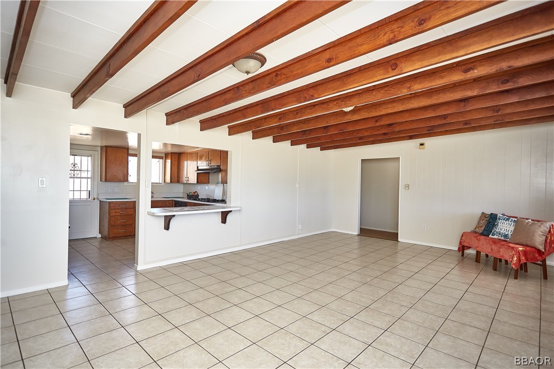 19616 Huasna Road Apple Valley, CA 92307 - Photo 9 of 48 a view of a room with cabinet