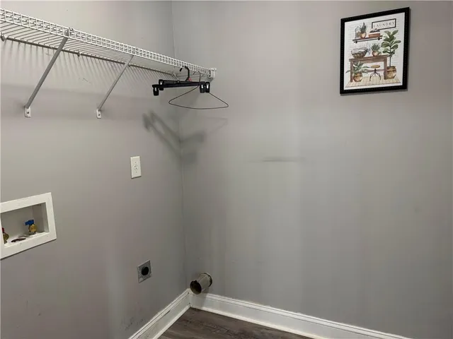 a view of small space with racks on the wall