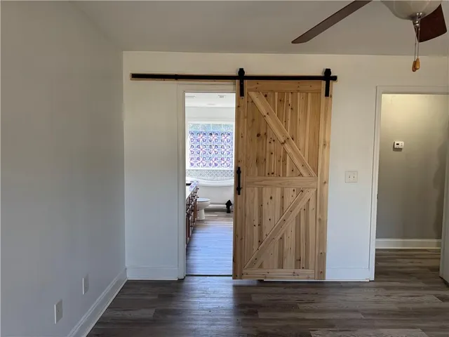 a view of entryway with wooden floor