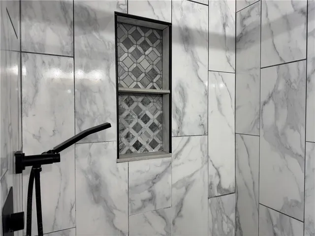 a bathroom with a bathtub