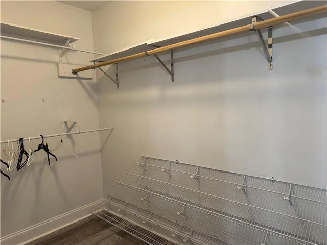 a view of a room with racks on the wall