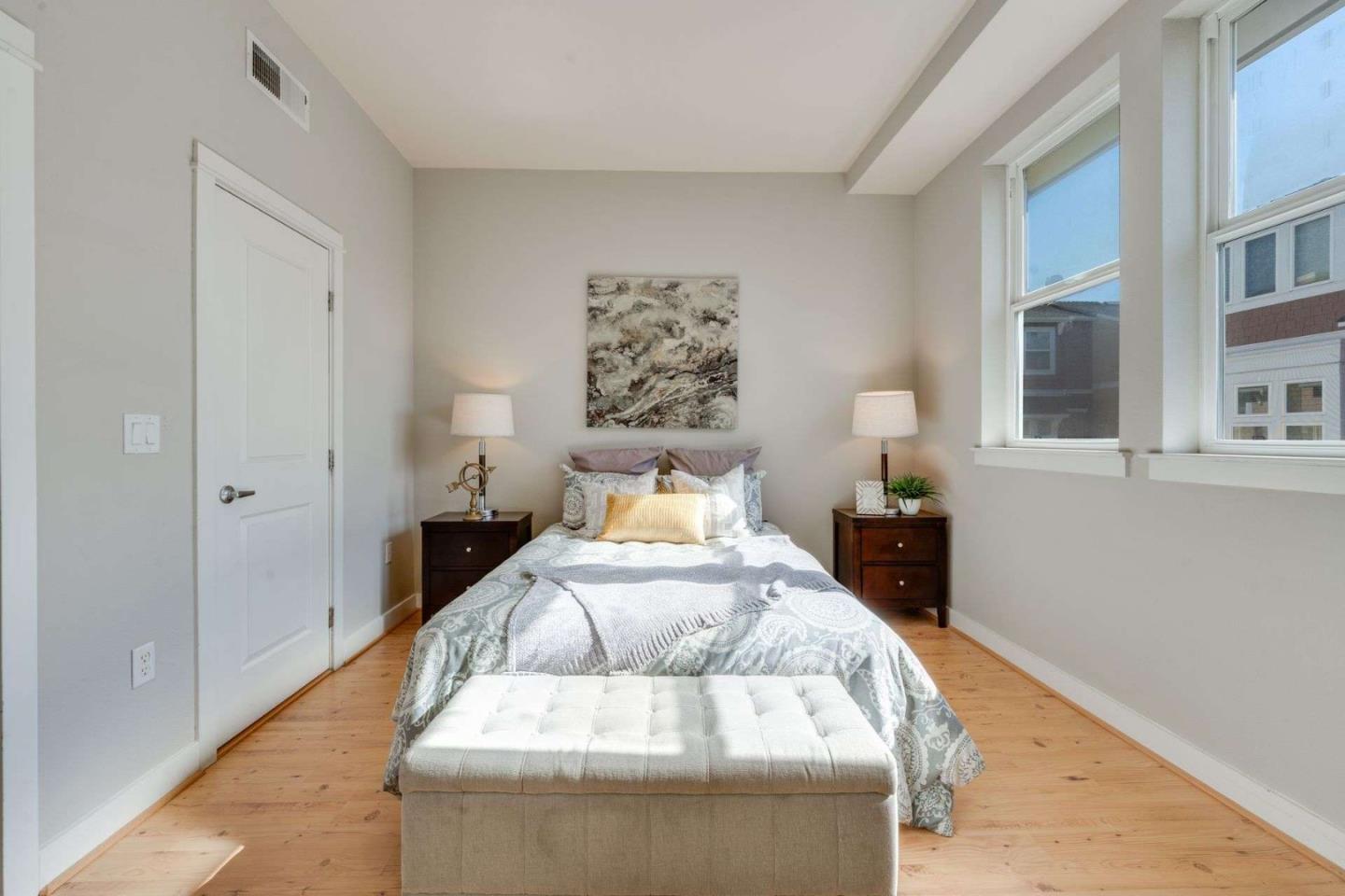 885 Frederick Commons San Jose, CA 95126 - Photo 14 of 30 a spacious bedroom with a bed and a window