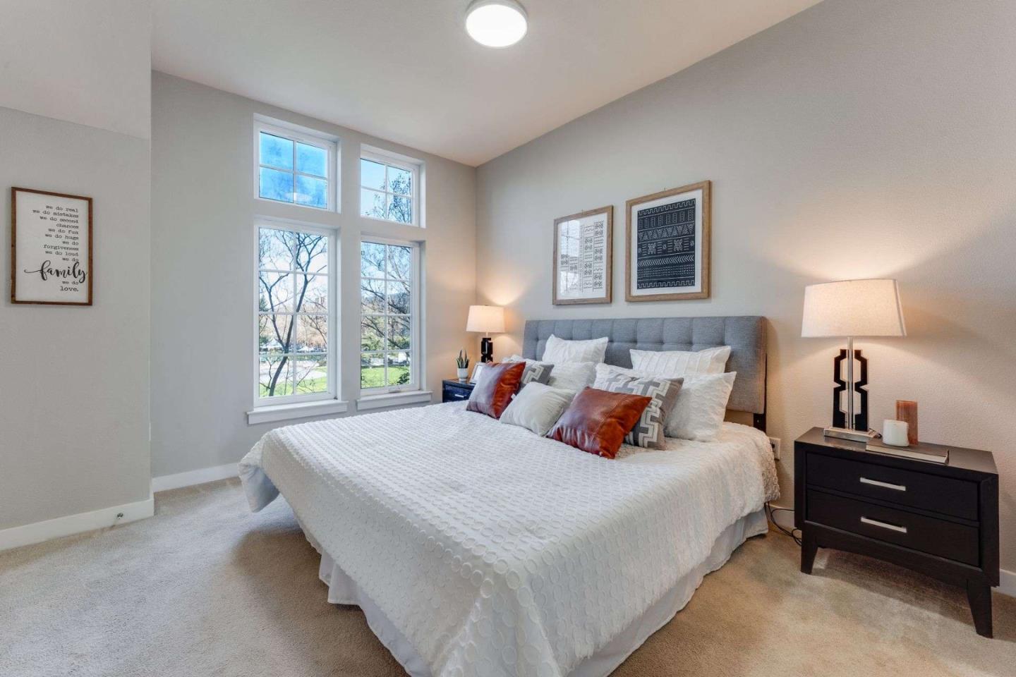 885 Frederick Commons San Jose, CA 95126 - Photo 15 of 30 a bedroom with a bed and a window