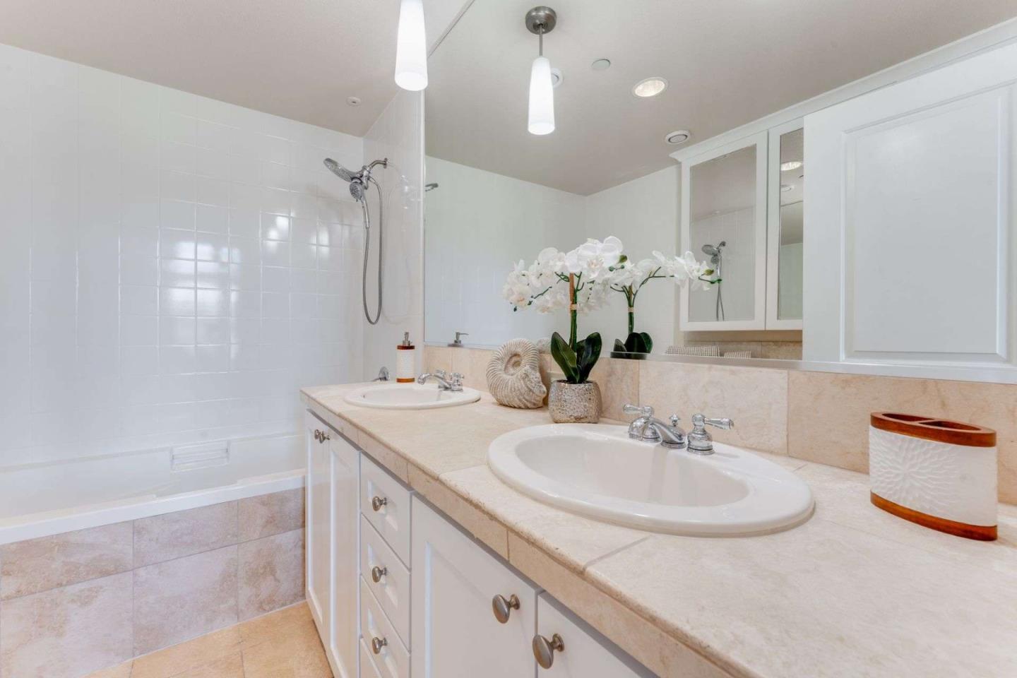 885 Frederick Commons San Jose, CA 95126 - Photo 18 of 30 a bathroom with a sink double vanity and a mirror