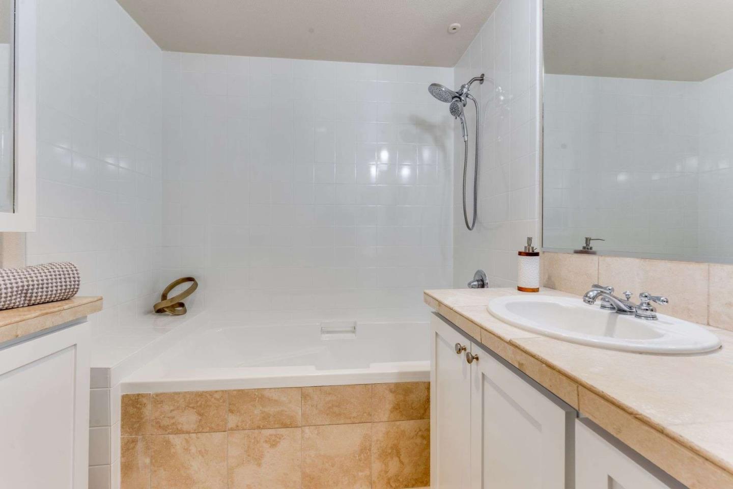 885 Frederick Commons San Jose, CA 95126 - Photo 19 of 30 a bathroom with a sink and mirror