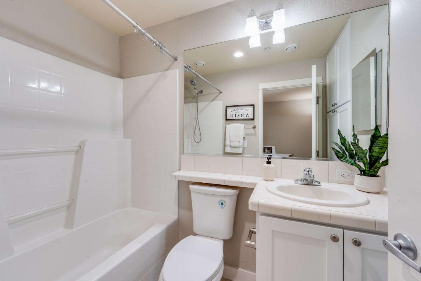 885 Frederick Commons San Jose, CA 95126 - Photo 20 of 30 a bathroom with a sink toilet and shower