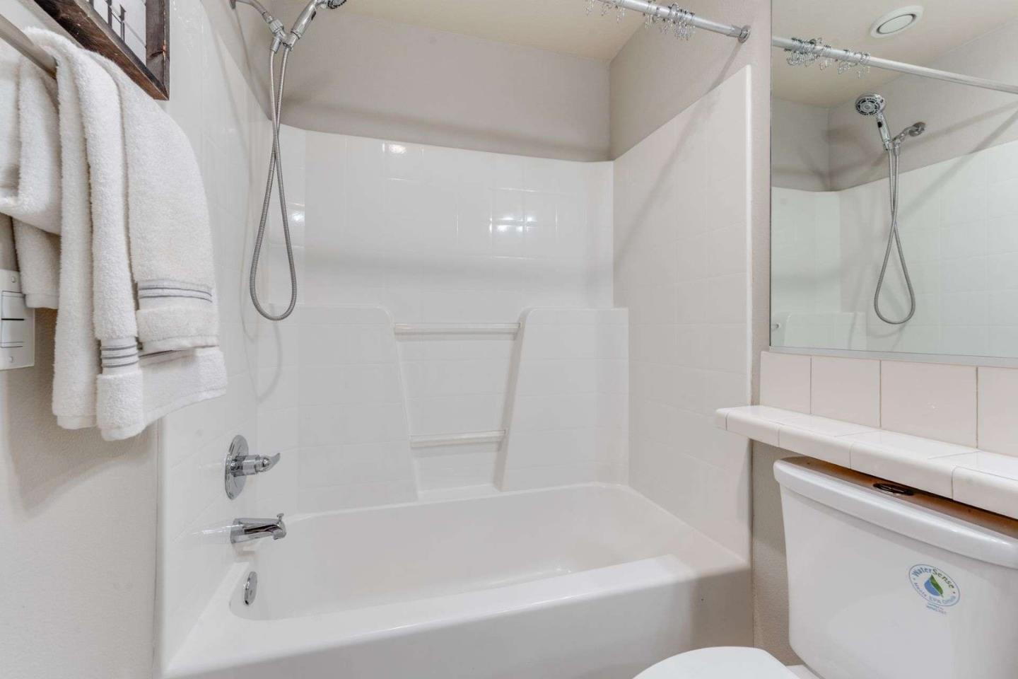 885 Frederick Commons San Jose, CA 95126 - Photo 21 of 30 a bathroom with a bath tub with a shower