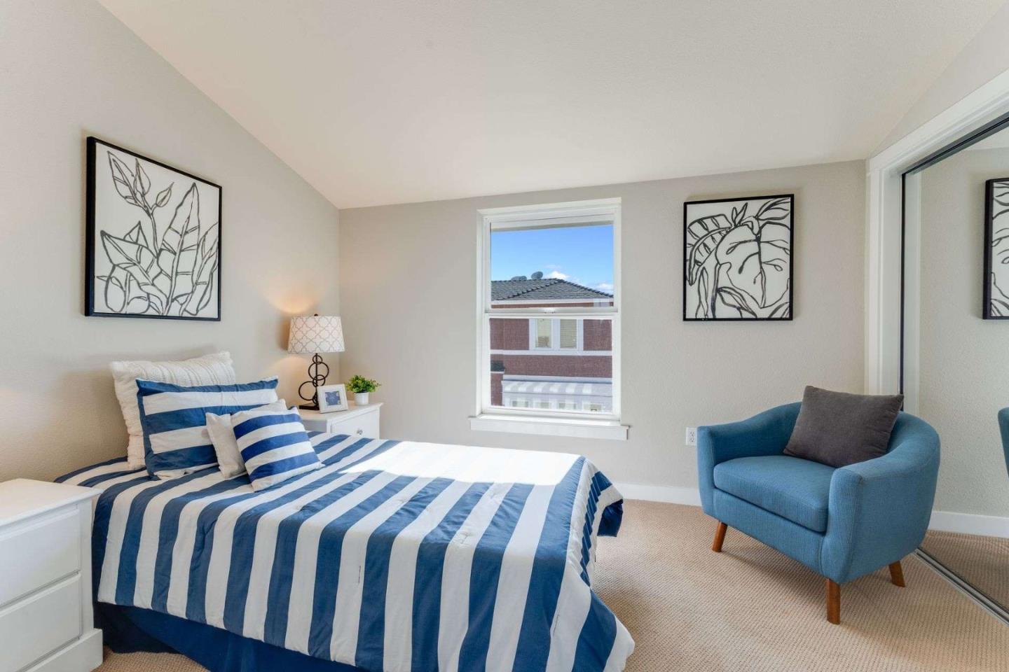 885 Frederick Commons San Jose, CA 95126 - Photo 22 of 30 a bedroom with a bed and a couch