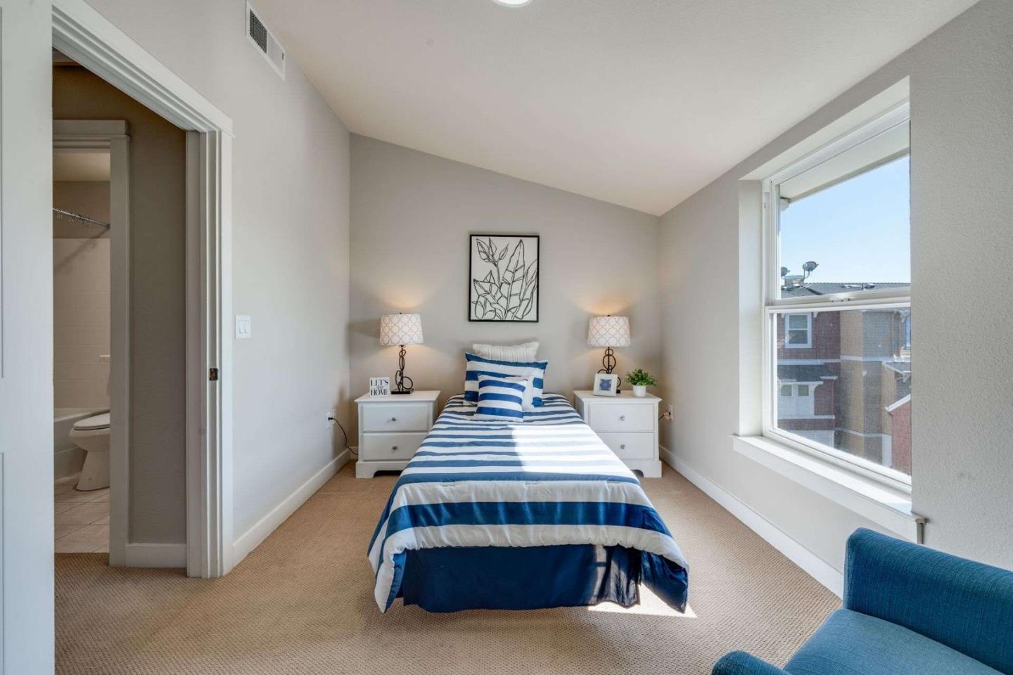 885 Frederick Commons San Jose, CA 95126 - Photo 23 of 30 a view of a bedroom with furniture and window