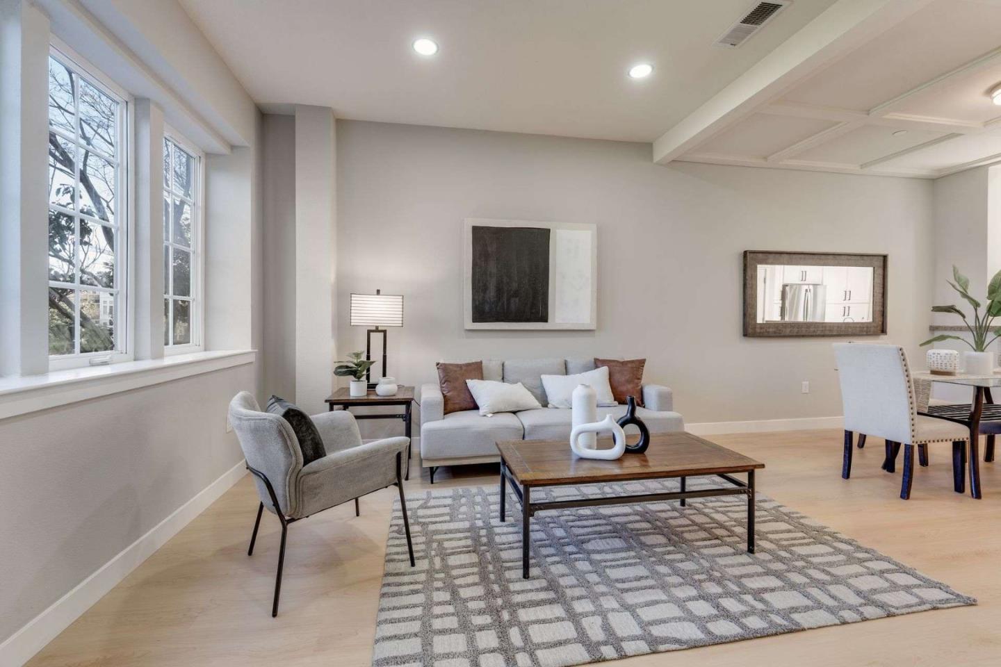 885 Frederick Commons San Jose, CA 95126 - Photo 5 of 30 a living room with furniture a rug a lamp and a window