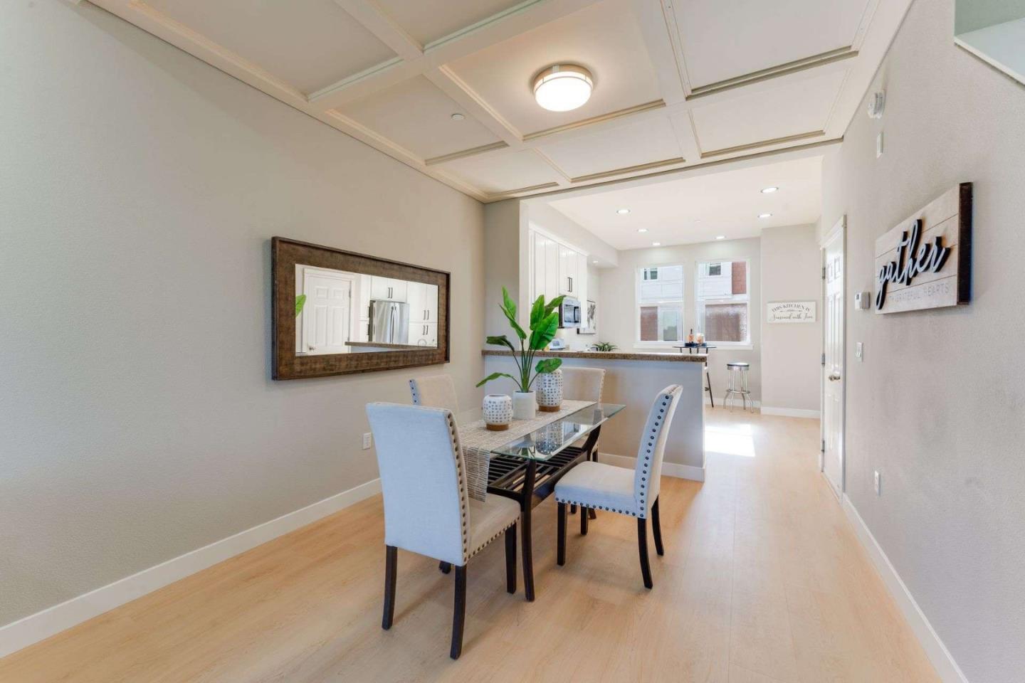 885 Frederick Commons San Jose, CA 95126 - Photo 8 of 30 a view of a dining room with furniture and wooden floor