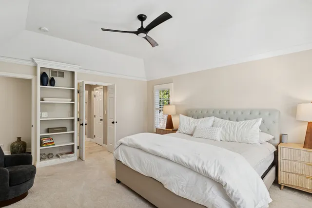 a bedroom with a bed and closet