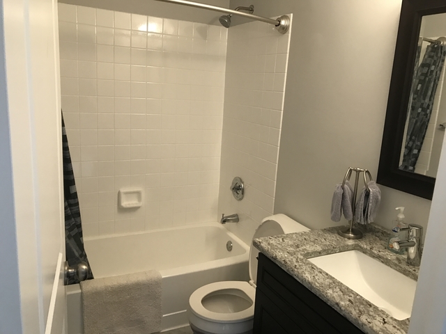 126 North Oltendorf Road Streamwood, IL 60107 - Photo 13 of 16 a bathroom with a granite countertop sink toilet and shower
