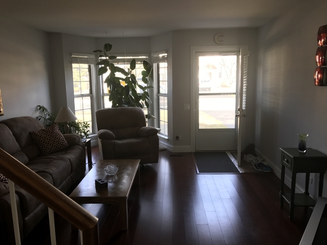 126 North Oltendorf Road Streamwood, IL 60107 - Photo 3 of 16 a living room with furniture and a large window