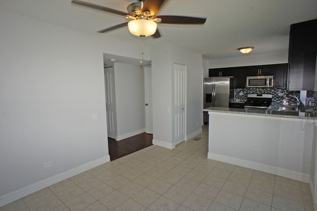 126 North Oltendorf Road Streamwood, IL 60107 - Photo 8 of 16 a view of a kitchen with a sink and dishwasher