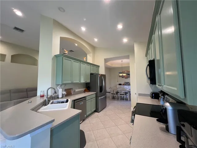 a bathroom with a sink double vanity and a mirror