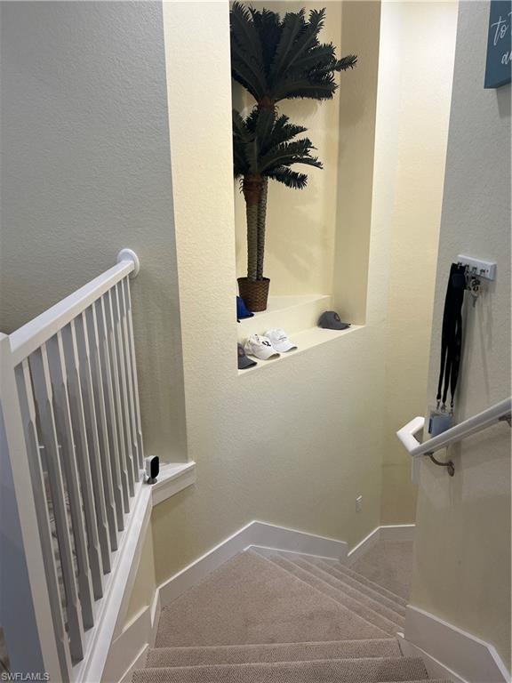 6809 Ascot Drive, Unit 201 Naples, FL 34113 - Photo 26 of 37 a bathroom with a window