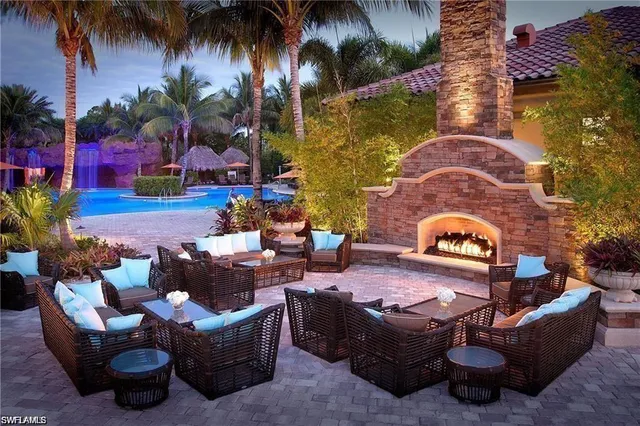 a outdoor living space with furniture and a potted plant