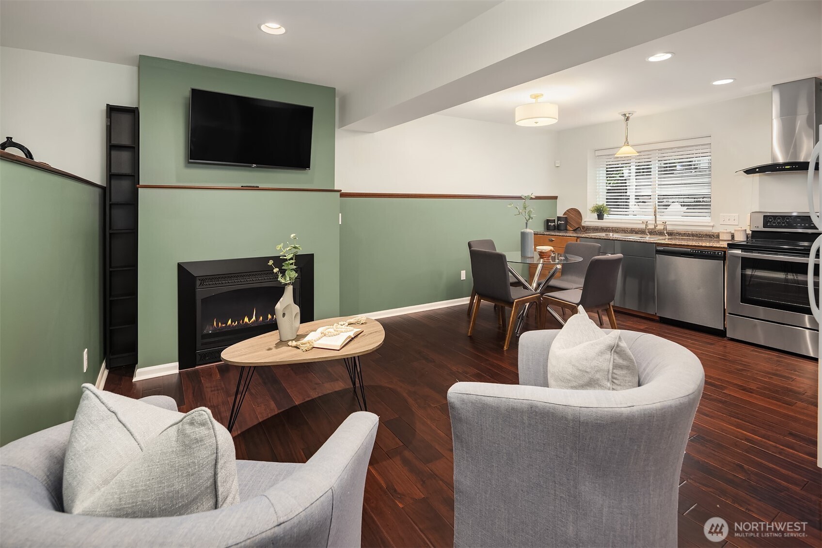 1629 22nd Avenue Seattle, WA 98122 - Photo 22 of 38 a living room with furniture and a flat screen tv