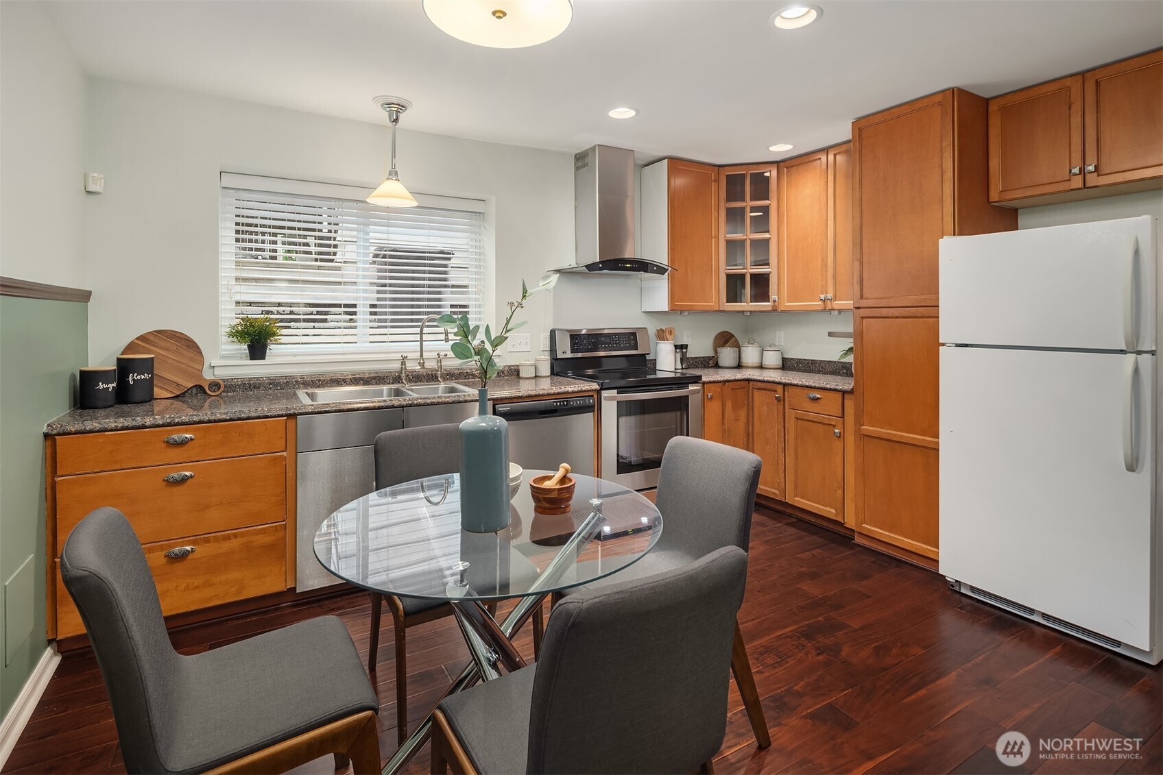 1629 22nd Avenue Seattle, WA 98122 - Photo 23 of 38 a kitchen with granite countertop a sink stove and refrigerator