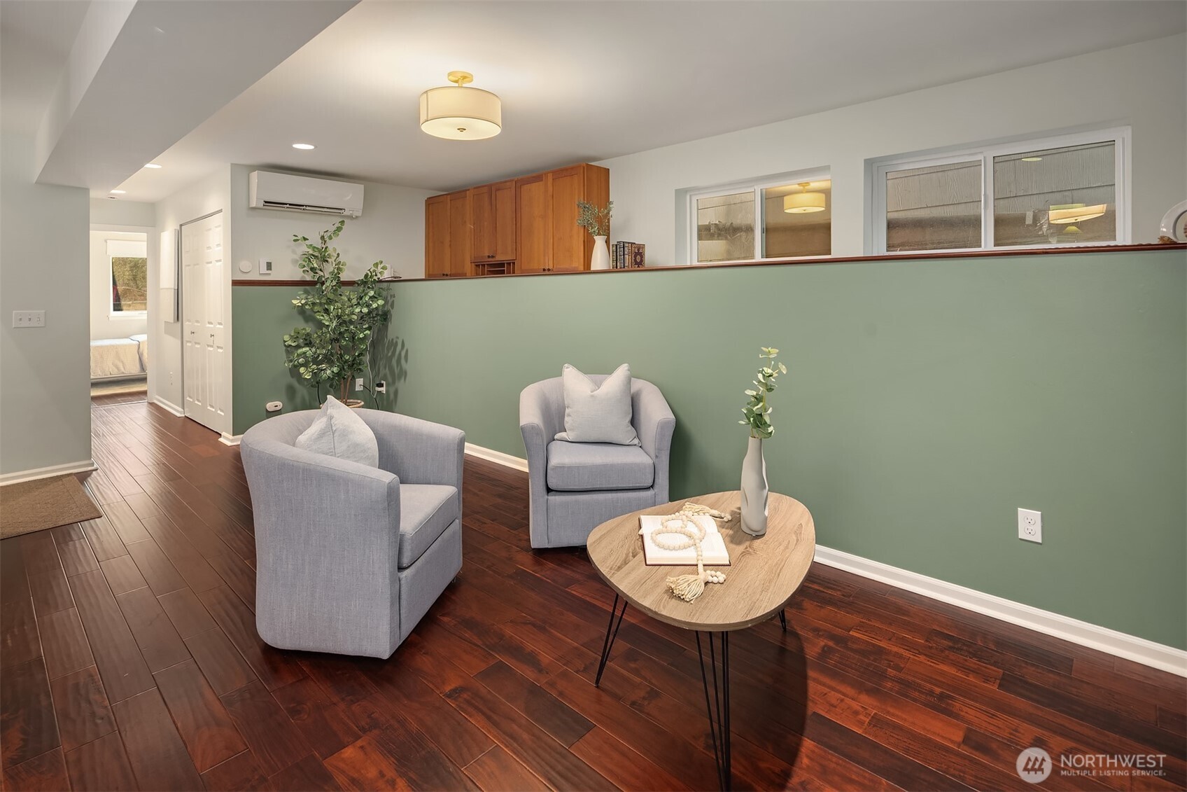 1629 22nd Avenue Seattle, WA 98122 - Photo 24 of 38 a living room with furniture and a wooden floor
