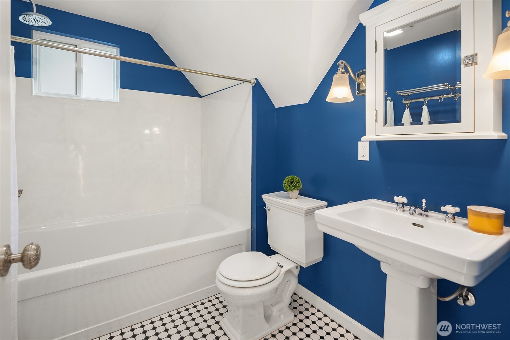 1629 22nd Avenue Seattle, WA 98122 - Photo 31 of 38 a bathroom with a sink and a toilet