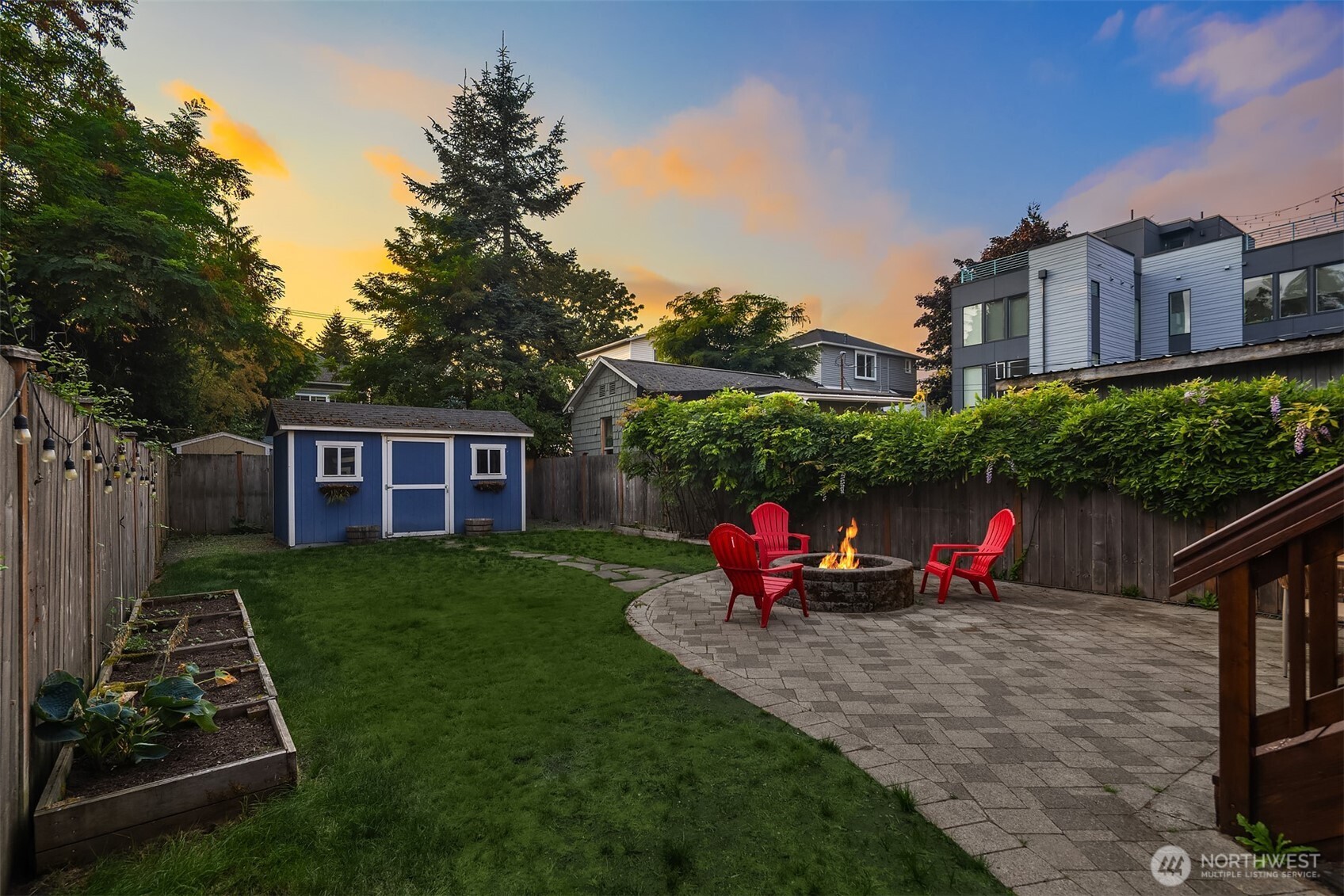 1629 22nd Avenue Seattle, WA 98122 - Photo 35 of 38 a view of a house with a back yard