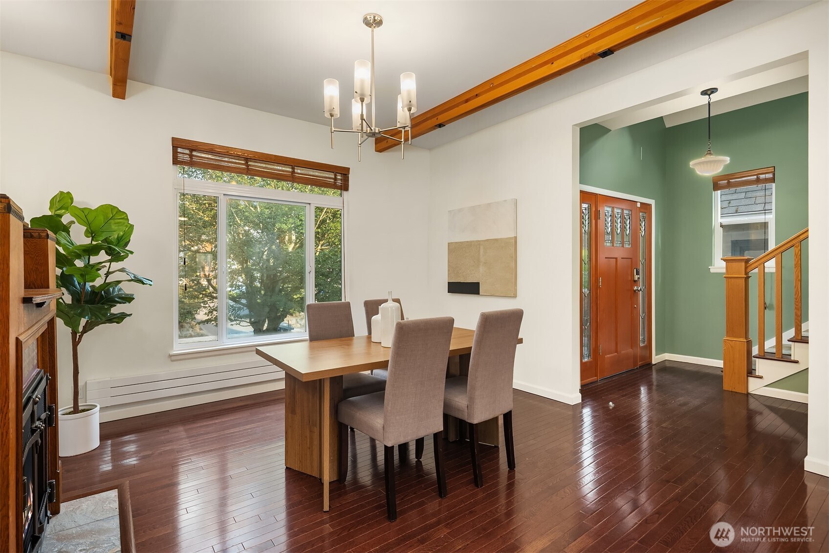 1629 22nd Avenue Seattle, WA 98122 - Photo 7 of 38 a view of a dining room with furniture window and wooden floor