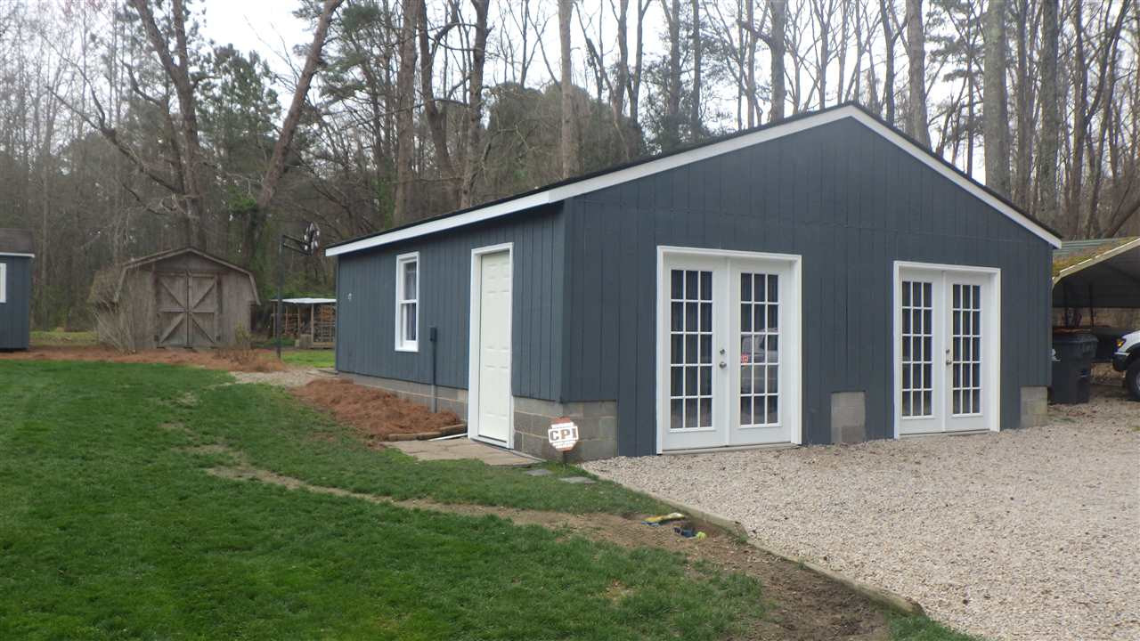7434 Riley Hill Road Zebulon, NC 27597 - Photo 21 of 23 Heated and finished garage which has working Kitchen! Garage