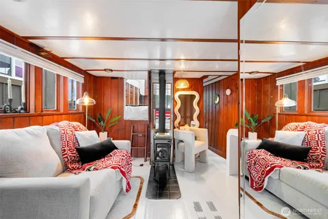 a living room with furniture and a walk in closet