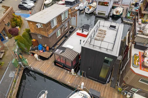 an aerial view of a house with outdoor space