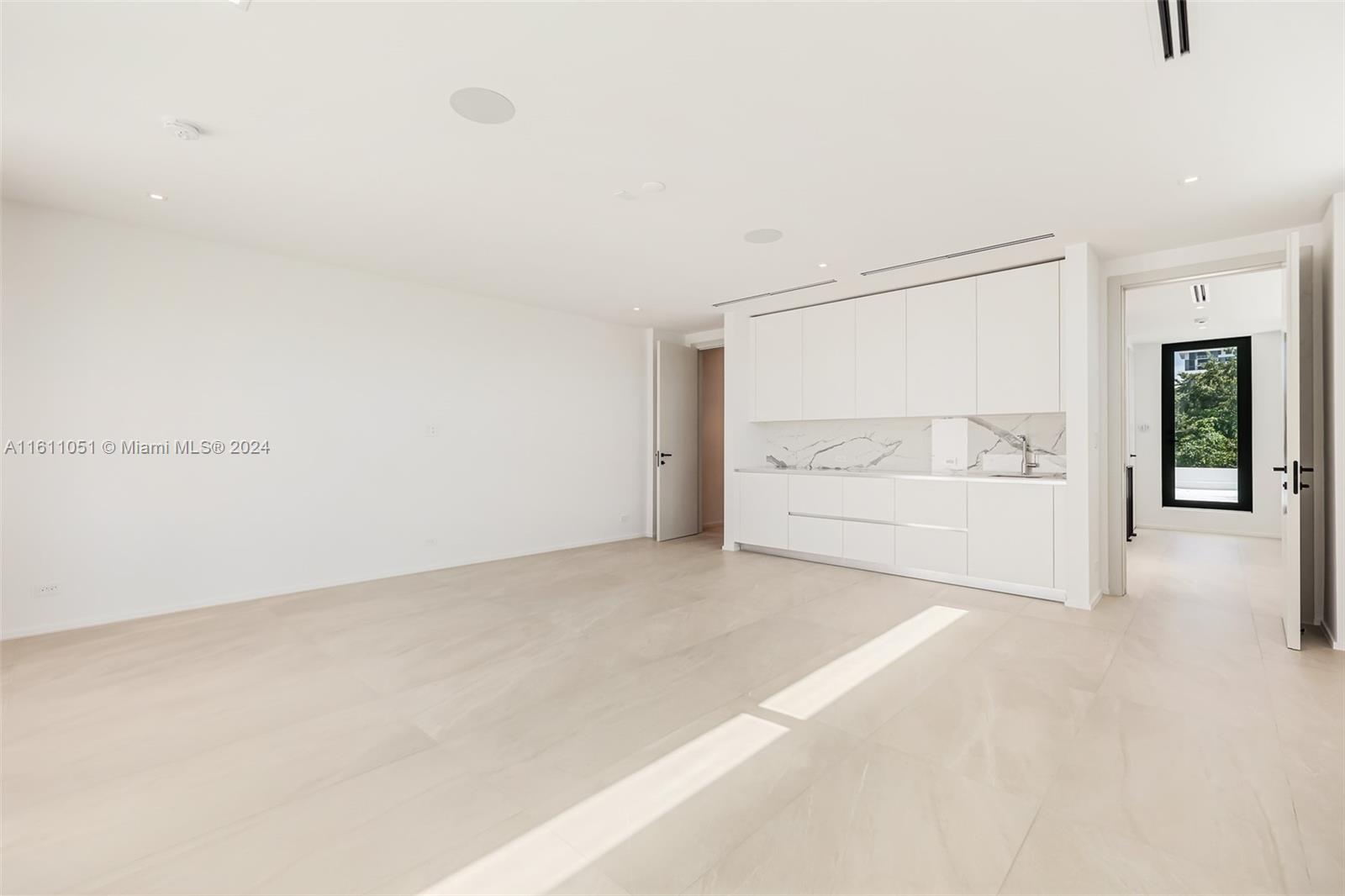 2832 Coconut Avenue, Unit 2832 Miami, FL 33133 - Photo 22 of 24 a view of an empty room with a window