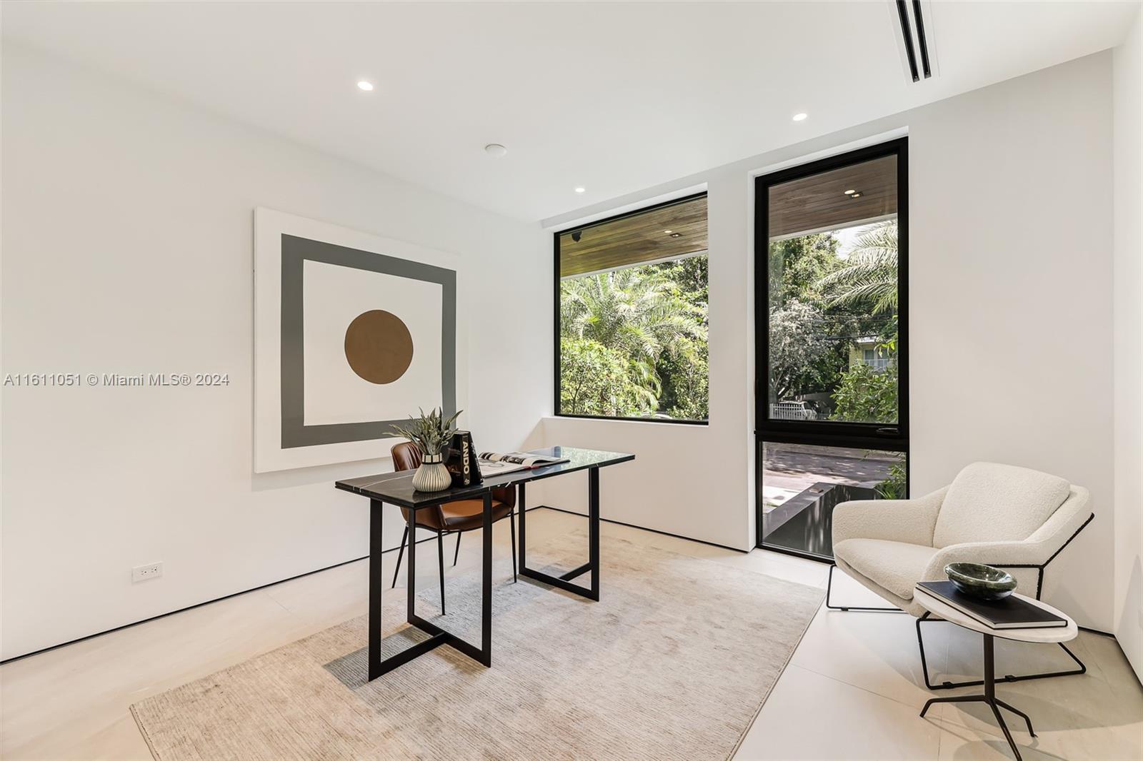 2832 Coconut Avenue, Unit 2832 Miami, FL 33133 - Photo 10 of 24 a work room with furniture and a window