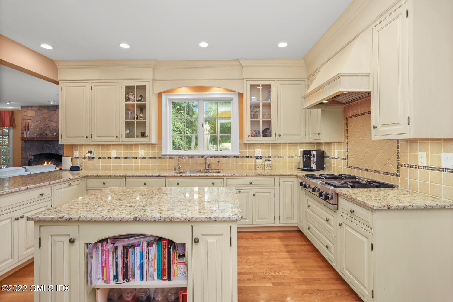 9 Robin Place Old Greenwich, CT 06870 - Photo 11 of 51 a kitchen with stainless steel appliances granite countertop a stove a sink and a white cabinets
