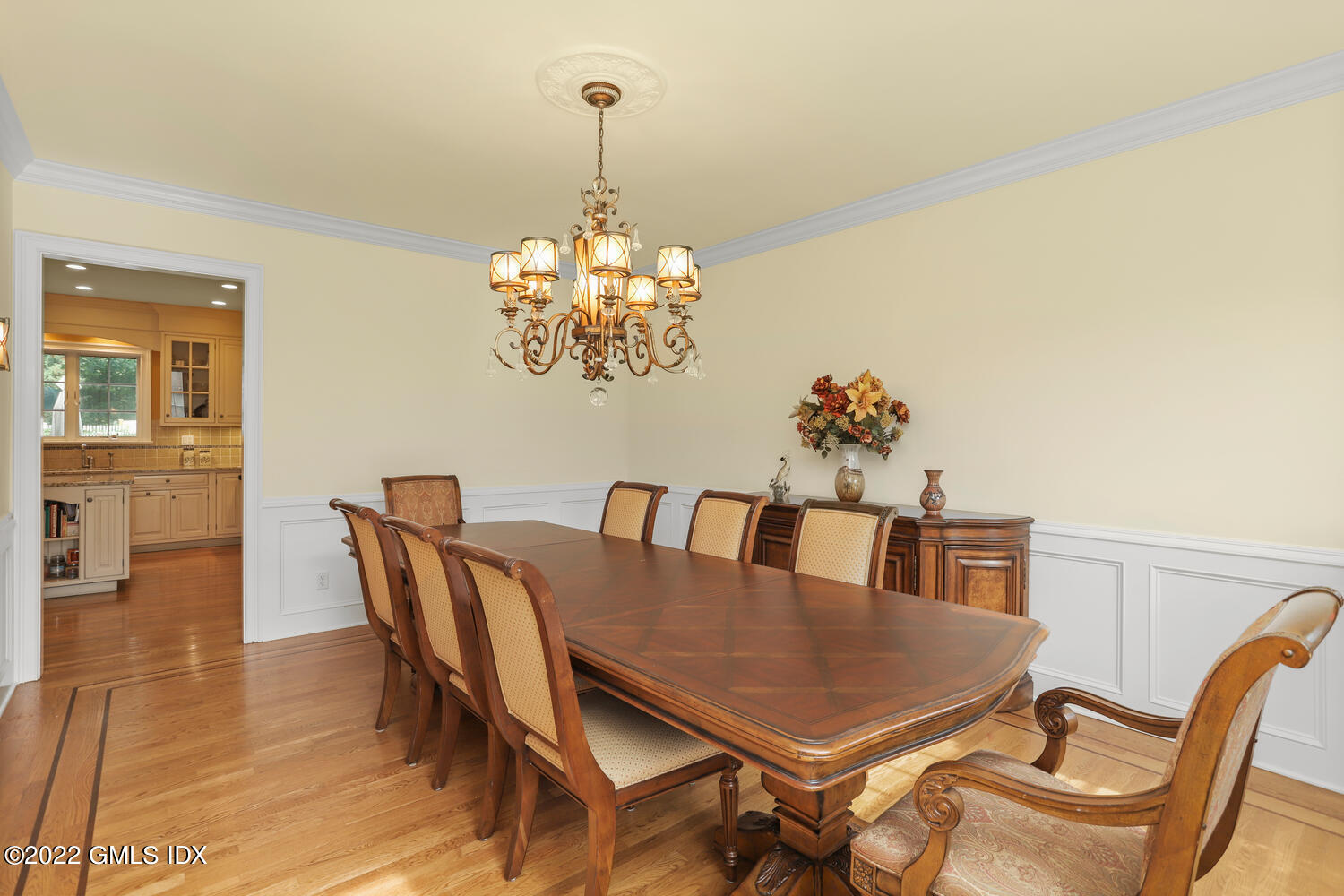 9 Robin Place Old Greenwich, CT 06870 - Photo 14 of 51 a view of a dining room with furniture wooden floor and chandelier