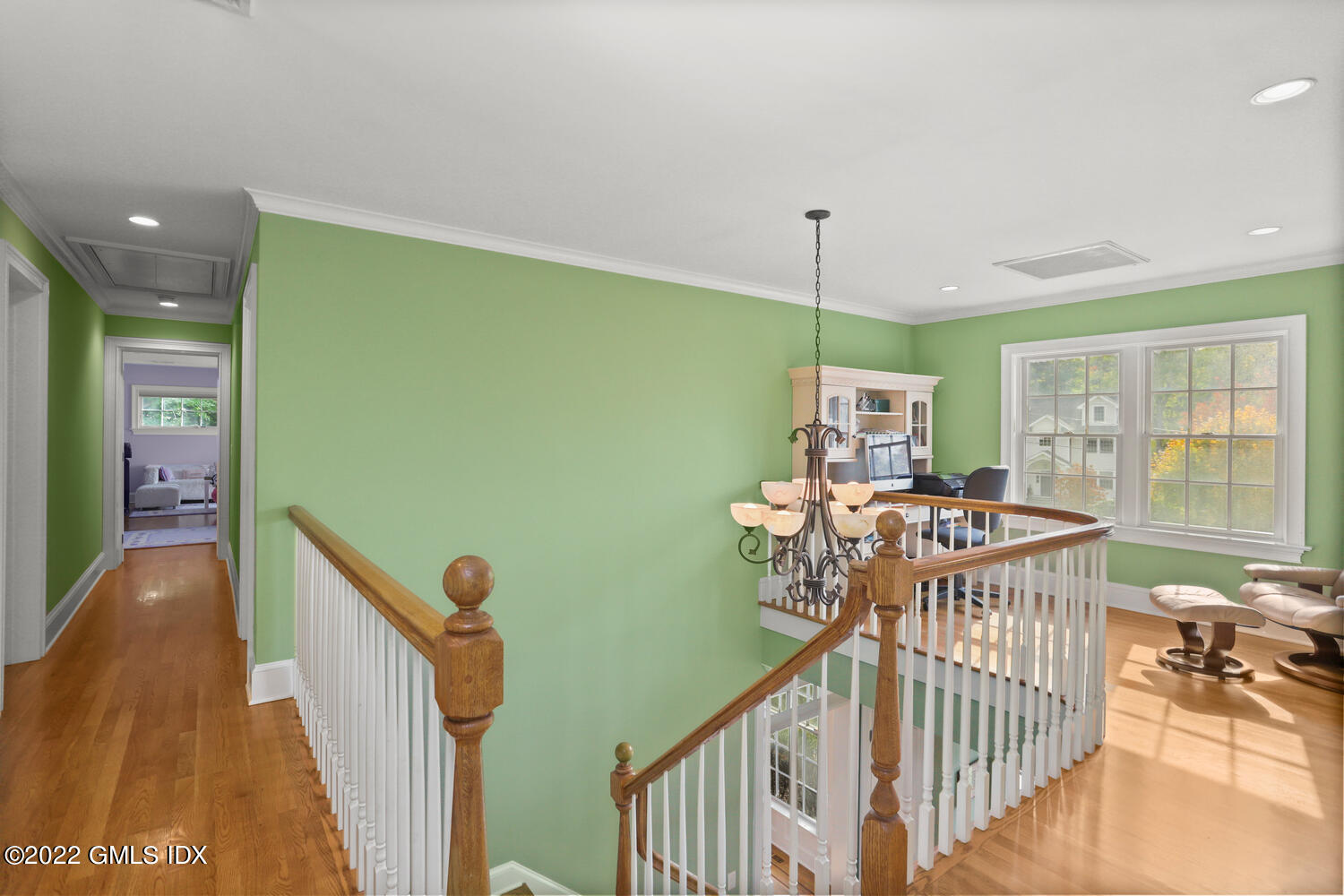 9 Robin Place Old Greenwich, CT 06870 - Photo 20 of 51 a view of a hallway with furniture and chandelier
